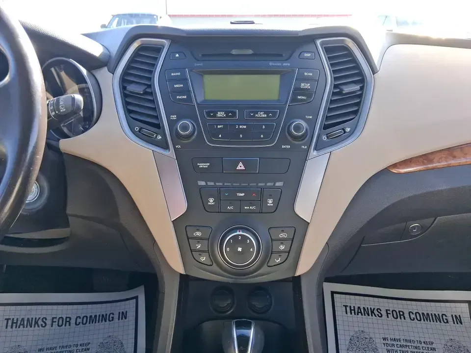 2013 Hyundai Santa Fe Sport (5XYZU3LB7DG) with an Theta II 2.4L I-4 gasoline direct injection engine, 6-Speed Automatic transmission, located at 1951 S Dayton Lakeview Rd., New Carlisle, OH, 45344, (937) 908-9800, 39.890999, -84.050255 - Need one SUV that can handle school drop-offs, I75 commutes, and a weekend escape to Taylorsville MetroPark without draining your budget? This 2013 Hyundai Santa Fe Sport is a smart, road-trip-ready crossover that blends everyday practicality with comfort features you'll appreciate on longer drives - Photo#13