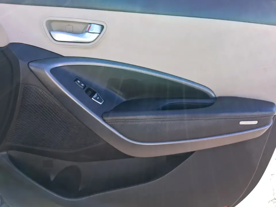 2013 Hyundai Santa Fe Sport (5XYZU3LB7DG) with an Theta II 2.4L I-4 gasoline direct injection engine, 6-Speed Automatic transmission, located at 1951 S Dayton Lakeview Rd., New Carlisle, OH, 45344, (937) 908-9800, 39.890999, -84.050255 - Need one SUV that can handle school drop-offs, I75 commutes, and a weekend escape to Taylorsville MetroPark without draining your budget? This 2013 Hyundai Santa Fe Sport is a smart, road-trip-ready crossover that blends everyday practicality with comfort features you'll appreciate on longer drives - Photo#19