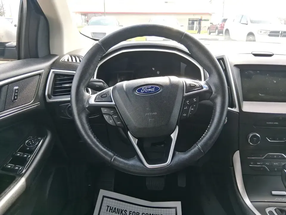 2016 Ford Edge SEL (2FMPK4J88GB) with an 3.5L V6 DOHC 24V engine, 6A transmission, located at 1099 N County Rd 25A, Troy, OH, 45373, (937) 908-9800, 40.057079, -84.212883 - Need one SUV that can handle school drop-offs, long commutes to Dayton, and spontaneous weekend getaways without feeling like a chore? This **2016 Ford Edge SEL** is built for real-life driving in and around **Xenia, Ohio**-with the comfort your family wants, the confidence you need in changing weat - Photo#16