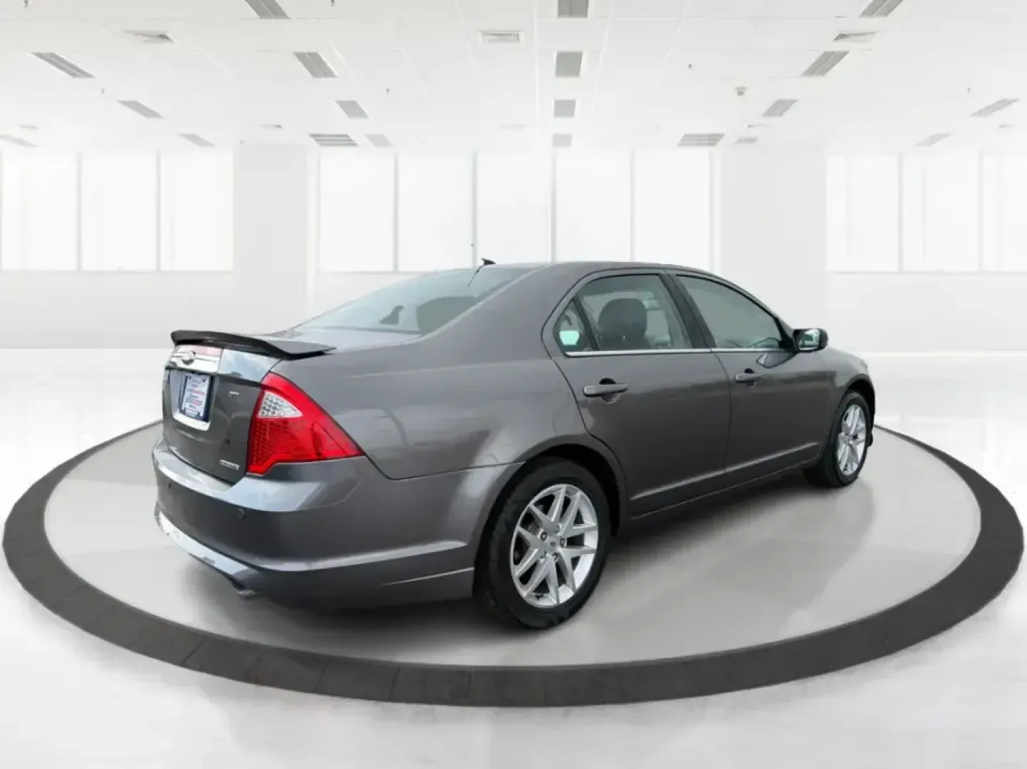 2012 Ford Fusion SEL (3FAHP0JG7CR) with an 3.0L V6 DOHC 24V engine, located at 1099 N County Rd 25A, Troy, OH, 45373, (937) 908-9800, 40.057079, -84.212883 - Need a dependable sedan that can handle the weekday commute to Dayton, quick runs up I75, and comfortable weekend drives through Miami County without draining your budget? This 2012 Ford Fusion SEL is a smart, real-world choice for drivers who want a smooth ride, confident power, and everyday practi - Photo#2