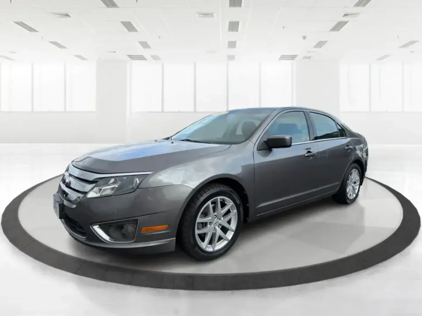 2012 Ford Fusion SEL (3FAHP0JG7CR) with an 3.0L V6 DOHC 24V engine, located at 1099 N County Rd 25A, Troy, OH, 45373, (937) 908-9800, 40.057079, -84.212883 - Need a dependable sedan that can handle the weekday commute to Dayton, quick runs up I75, and comfortable weekend drives through Miami County without draining your budget? This 2012 Ford Fusion SEL is a smart, real-world choice for drivers who want a smooth ride, confident power, and everyday practi - Photo#8