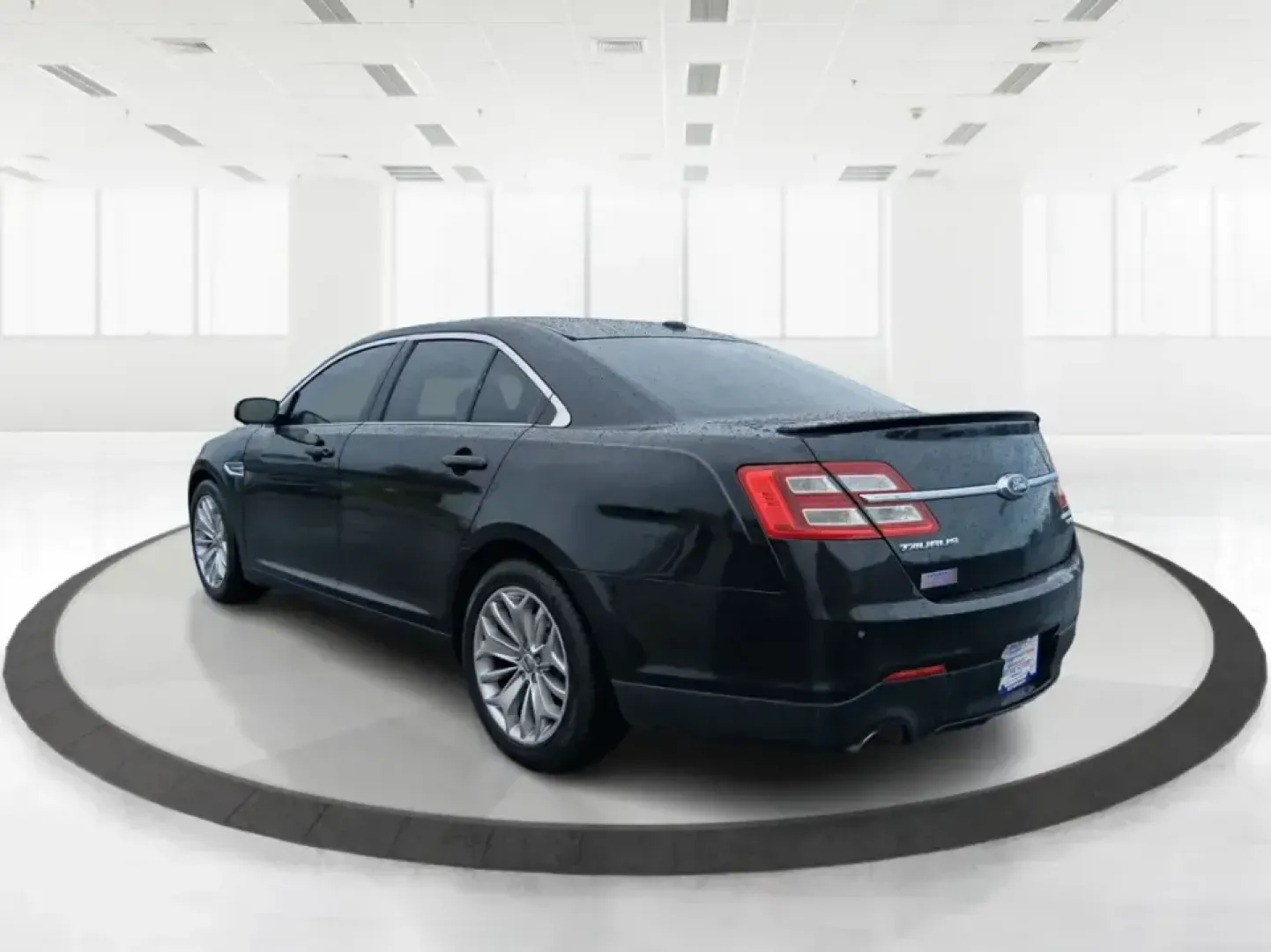 2014 Ford Taurus Limited FWD (1FAHP2F80EG) with an 3.5L V6 DOHC 24V engine, 6-Speed Automatic transmission, located at 8750 N County Rd 25A, Piqua, OH, 45356, (937) 908-9800, 40.164391, -84.232513 - Need a comfortable, confidence-inspiring sedan for a daily commute between Piqua and Dayton, school drop-offs, or weekend getaways up I-75? This 2014 Ford Taurus Limited FWD delivers the kind of quiet, upscale ride that makes long drives feel shorter-while still keeping practicality front and center - Photo#4