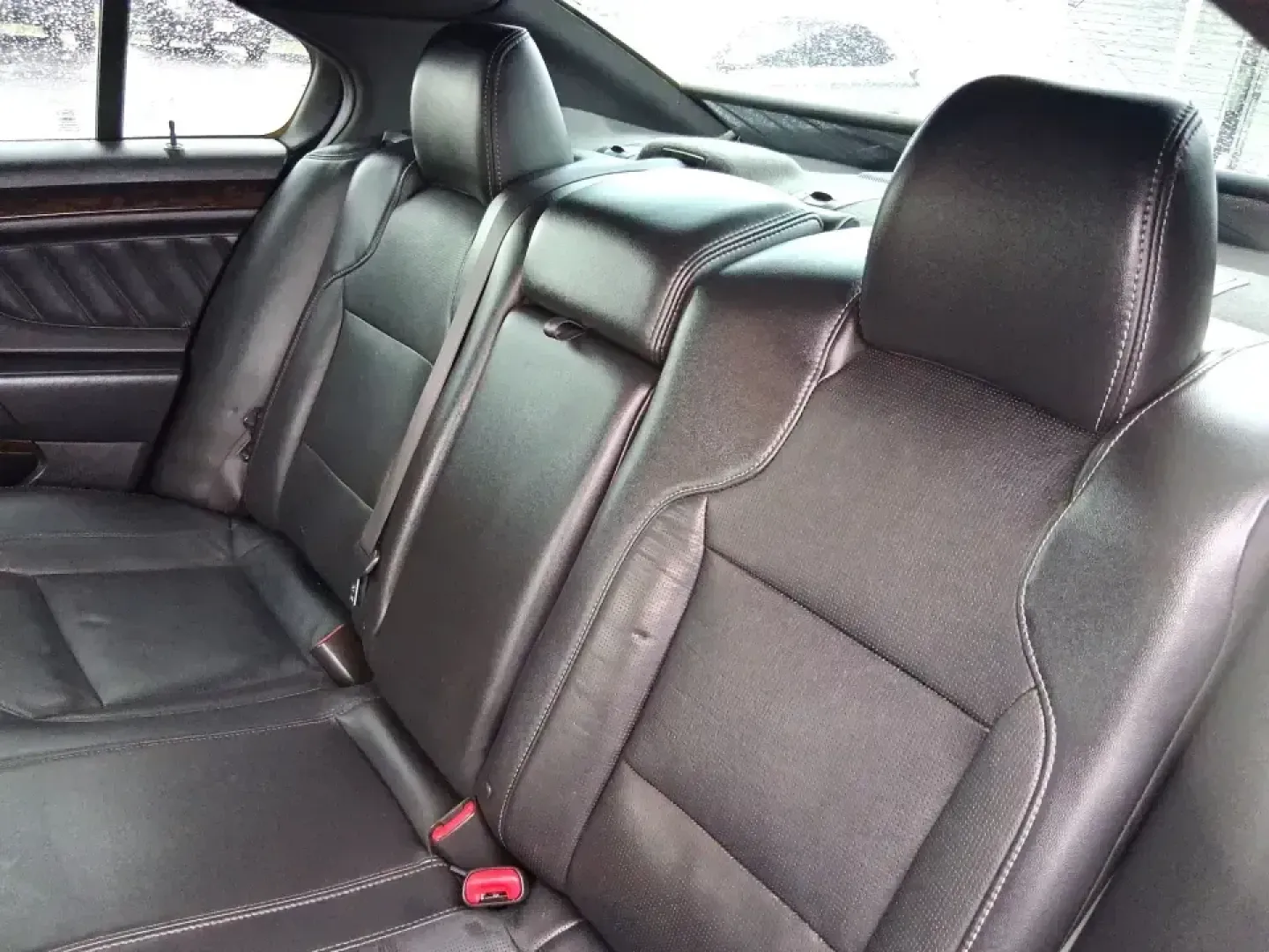 2014 Ford Taurus Limited FWD (1FAHP2F80EG) with an 3.5L V6 DOHC 24V engine, 6-Speed Automatic transmission, located at 8750 N County Rd 25A, Piqua, OH, 45356, (937) 908-9800, 40.164391, -84.232513 - Need a comfortable, confidence-inspiring sedan for a daily commute between Piqua and Dayton, school drop-offs, or weekend getaways up I-75? This 2014 Ford Taurus Limited FWD delivers the kind of quiet, upscale ride that makes long drives feel shorter-while still keeping practicality front and center - Photo#10