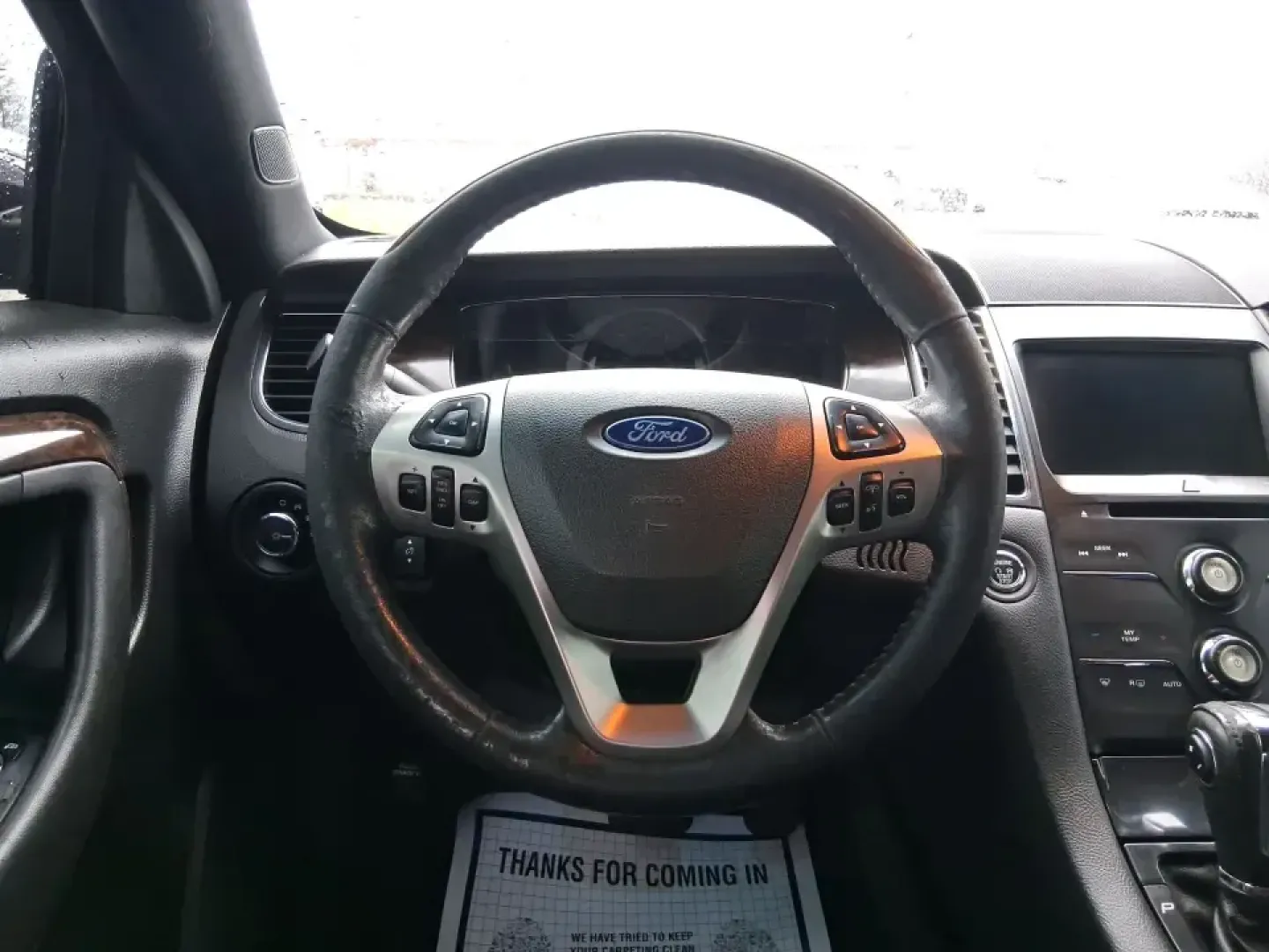 2014 Ford Taurus Limited FWD (1FAHP2F80EG) with an 3.5L V6 DOHC 24V engine, 6-Speed Automatic transmission, located at 8750 N County Rd 25A, Piqua, OH, 45356, (937) 908-9800, 40.164391, -84.232513 - Need a comfortable, confidence-inspiring sedan for a daily commute between Piqua and Dayton, school drop-offs, or weekend getaways up I-75? This 2014 Ford Taurus Limited FWD delivers the kind of quiet, upscale ride that makes long drives feel shorter-while still keeping practicality front and center - Photo#16