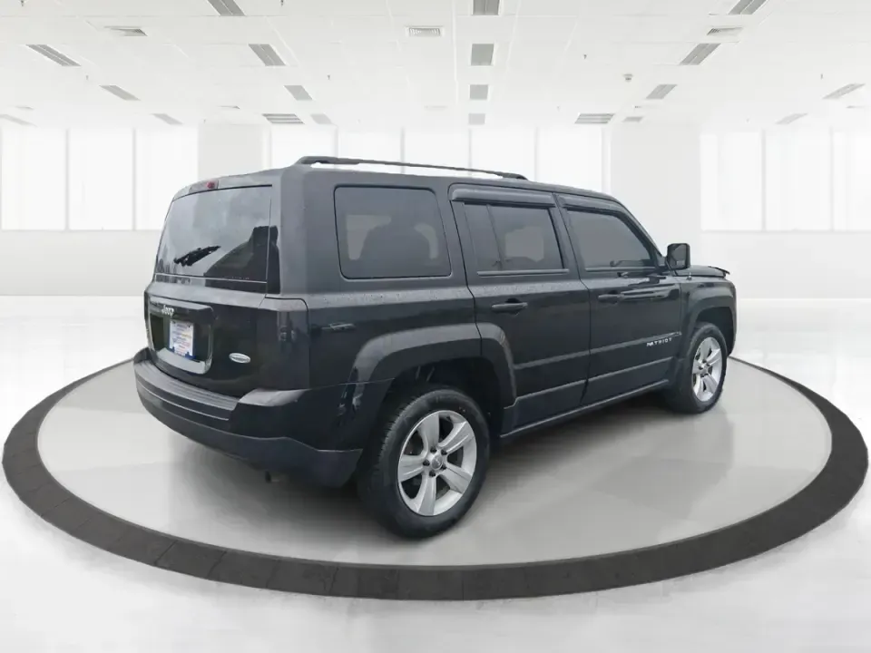 2015 Jeep Patriot Latitude (1C4NJRFB8FD) with an 2.4L I-4 DOHC engine, located at 1951 S Dayton Lakeview Rd., New Carlisle, OH, 45344, (937) 908-9800, 39.890999, -84.050255 - Weekend escapes, snowy school runs, and daily commutes down I75 all get easier when you've got an SUV that's ready for Ohio weather and real-life schedules. This **2015 Jeep Patriot Latitude 4WD** is a practical choice for drivers who want the Jeep look and capability without the oversized footprint - Photo#2