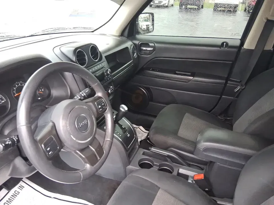 2015 Jeep Patriot Latitude (1C4NJRFB8FD) with an 2.4L I-4 DOHC engine, located at 1184 Kauffman Ave, Fairborn, OH, 45324, (937) 908-9800, 39.807072, -84.030914 - Weekend escapes, snowy school runs, and daily commutes down I75 all get easier when you've got an SUV that's ready for Ohio weather and real-life schedules. This **2015 Jeep Patriot Latitude 4WD** is a practical choice for drivers who want the Jeep look and capability without the oversized footprint - Photo#9