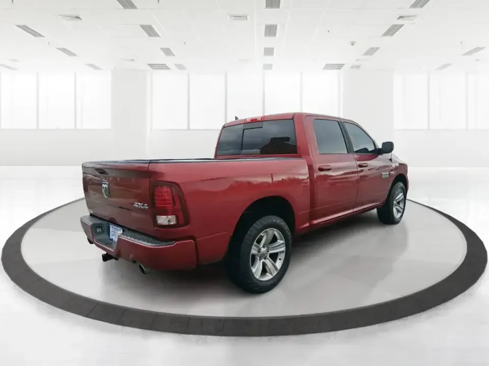 2014 Ram 1500 Sport (1C6RR7MT6ES) with an HEMI 5.7L V-8 variable valve control engine, 6-Speed Automatic transmission, located at 401 Woodman Dr, Riverside, OH, 45431, (937) 908-9800, 39.760899, -84.123421 - Need a truck that can handle weekday work, weekend getaways, and everything Ohio weather throws at you? This Flame Red Clearcoat 2014 Ram 1500 Sport Crew Cab 4WD is built for real life-hauling project supplies to a home in Riverside, towing toys for a day near Eastwood MetroPark, or loading up the f - Photo#2