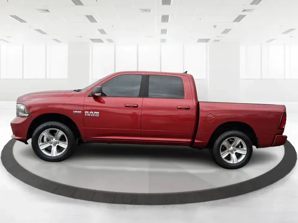 2014 Ram 1500 Sport (1C6RR7MT6ES) with an HEMI 5.7L V-8 variable valve control engine, 6-Speed Automatic transmission, located at 401 Woodman Dr, Riverside, OH, 45431, (937) 908-9800, 39.760899, -84.123421 - Need a truck that can handle weekday work, weekend getaways, and everything Ohio weather throws at you? This Flame Red Clearcoat 2014 Ram 1500 Sport Crew Cab 4WD is built for real life-hauling project supplies to a home in Riverside, towing toys for a day near Eastwood MetroPark, or loading up the f - Photo#5