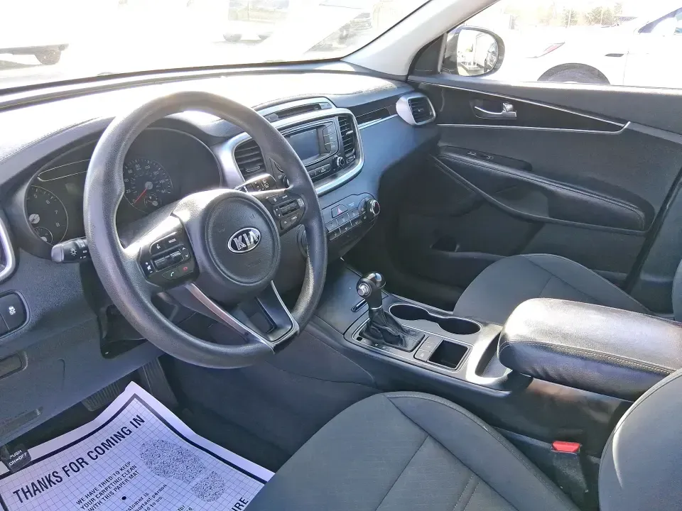 2017 Kia Sorento 2.4L LX (5XYPGDA36HG) with an 2.4L I-4 gasoline direct injection engine, 6A transmission, located at 1099 N County Rd 25A, Troy, OH, 45373, (937) 908-9800, 40.057079, -84.212883 - Picture your next weekend: groceries loaded, kids (or friends) comfortable in the back, and you're heading out of Troy for a quick getaway-maybe a stroll through downtown near the Miami River, a stop by Hobart Arena for an event, or an easy cruise up I75 toward Dayton. This 2017 Kia Sorento 2.4L LX - Photo#9