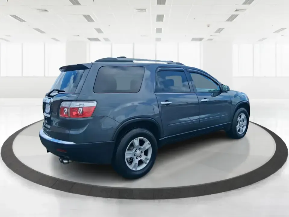 2012 GMC Acadia SL (1GKKRNED6CJ) with an 3.6L V-6 gasoline direct injection engine, 6-Speed Automatic transmission, located at 8750 N County Rd 25A, Piqua, OH, 45356, (937) 908-9800, 40.164391, -84.232513 - Pack up the kids, load the cooler, and point the SUV toward your next weekend getaway-this 2012 GMC Acadia SL is built for real-life Ohio driving, from school drop-offs and long commutes to road trips up I-75 and errands around Piqua. With three-row versatility, confident road manners, and family-fr - Photo#2