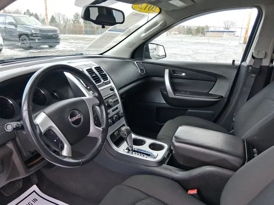 2012 GMC Acadia SL (1GKKRNED6CJ) with an 3.6L V-6 gasoline direct injection engine, 6-Speed Automatic transmission, located at 8750 N County Rd 25A, Piqua, OH, 45356, (937) 908-9800, 40.164391, -84.232513 - Pack up the kids, load the cooler, and point the SUV toward your next weekend getaway-this 2012 GMC Acadia SL is built for real-life Ohio driving, from school drop-offs and long commutes to road trips up I-75 and errands around Piqua. With three-row versatility, confident road manners, and family-fr - Photo#9