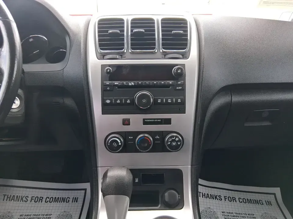 2012 GMC Acadia SL (1GKKRNED6CJ) with an 3.6L V-6 gasoline direct injection engine, 6-Speed Automatic transmission, located at 8750 N County Rd 25A, Piqua, OH, 45356, (937) 908-9800, 40.164391, -84.232513 - Pack up the kids, load the cooler, and point the SUV toward your next weekend getaway-this 2012 GMC Acadia SL is built for real-life Ohio driving, from school drop-offs and long commutes to road trips up I-75 and errands around Piqua. With three-row versatility, confident road manners, and family-fr - Photo#13