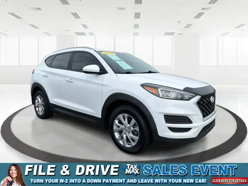 2019 Hyundai Tucson Value (KM8J33A41KU) with an Nu 2L I-4 gasoline direct injection engine, 6A transmission, located at 8750 N County Rd 25A, Piqua, OH, 45356, (937) 908-9800, 40.164391, -84.232513 - Picture your next Ohio weekend: loading up the cooler, tossing sports gear in the back, and cruising from Piqua to a family cookout or a quick getaway-without stressing about space, comfort, or the road ahead. This **2019 Hyundai Tucson Value** in **White Pearl** is the kind of compact SUV that fits - Photo#0