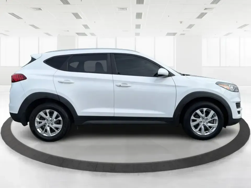 2019 Hyundai Tucson Value (KM8J33A41KU) with an Nu 2L I-4 gasoline direct injection engine, 6A transmission, located at 8750 N County Rd 25A, Piqua, OH, 45356, (937) 908-9800, 40.164391, -84.232513 - Picture your next Ohio weekend: loading up the cooler, tossing sports gear in the back, and cruising from Piqua to a family cookout or a quick getaway-without stressing about space, comfort, or the road ahead. This **2019 Hyundai Tucson Value** in **White Pearl** is the kind of compact SUV that fits - Photo#1