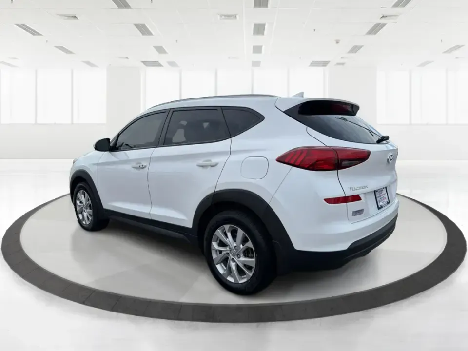 2019 Hyundai Tucson Value (KM8J33A41KU) with an Nu 2L I-4 gasoline direct injection engine, 6A transmission, located at 8750 N County Rd 25A, Piqua, OH, 45356, (937) 908-9800, 40.164391, -84.232513 - Picture your next Ohio weekend: loading up the cooler, tossing sports gear in the back, and cruising from Piqua to a family cookout or a quick getaway-without stressing about space, comfort, or the road ahead. This **2019 Hyundai Tucson Value** in **White Pearl** is the kind of compact SUV that fits - Photo#4