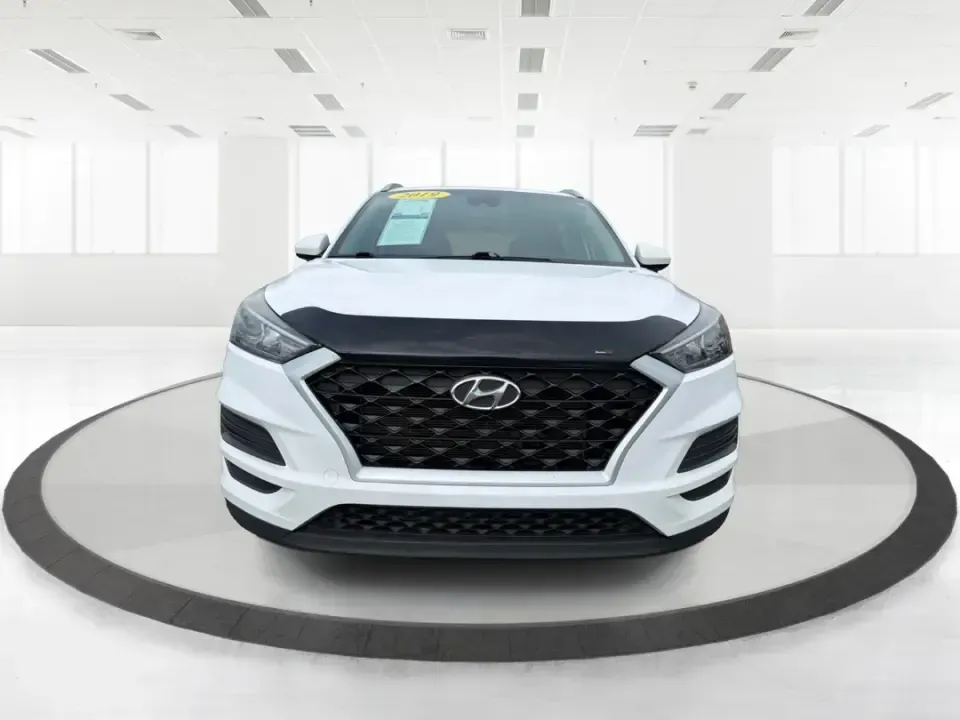 2019 Hyundai Tucson Value (KM8J33A41KU) with an Nu 2L I-4 gasoline direct injection engine, 6A transmission, located at 8750 N County Rd 25A, Piqua, OH, 45356, (937) 908-9800, 40.164391, -84.232513 - Picture your next Ohio weekend: loading up the cooler, tossing sports gear in the back, and cruising from Piqua to a family cookout or a quick getaway-without stressing about space, comfort, or the road ahead. This **2019 Hyundai Tucson Value** in **White Pearl** is the kind of compact SUV that fits - Photo#7