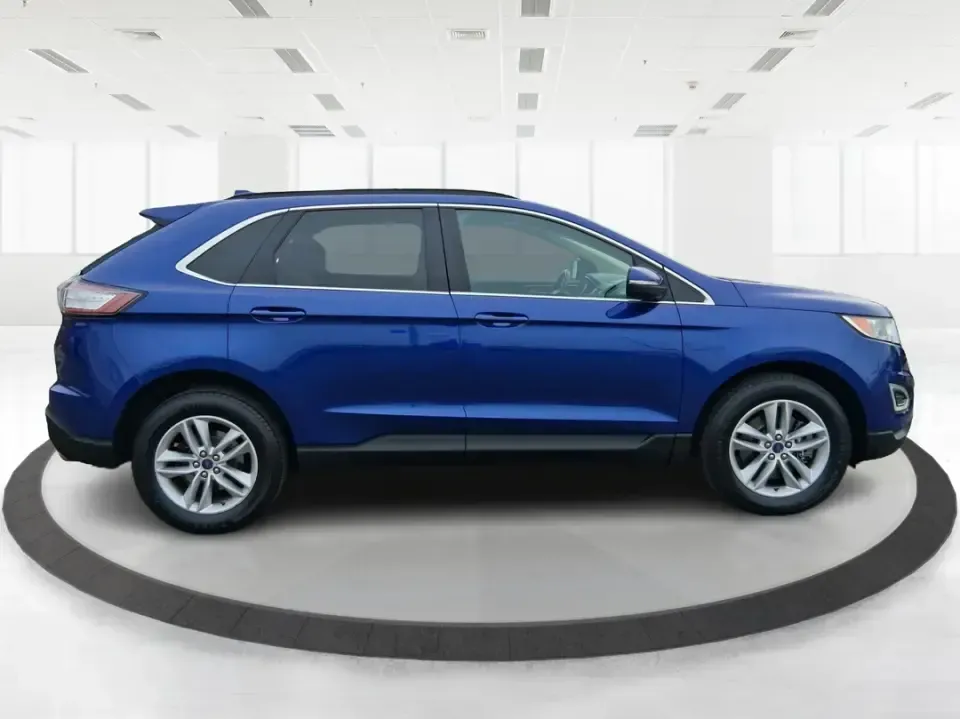 2015 Ford Edge SEL (2FMPK4J88FB) with an 3.5L V6 DOHC 24V engine, 6A transmission, located at 1099 N County Rd 25A, Troy, OH, 45373, (937) 908-9800, 40.057079, -84.212883 - Picture your next Ohio weekend: a quick grocery run through New Carlisle turns into a spontaneous drive out toward the Mad River, a family outing near the Clark County Fairgrounds, or an easy road trip down I70 and I675 with everyone comfortable and your gear packed. This 2015 Ford Edge SEL is built - Photo#1
