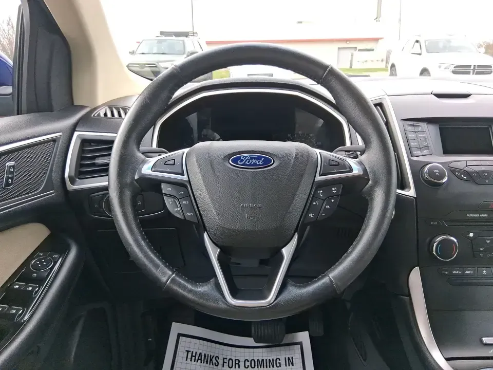2015 Ford Edge SEL (2FMPK4J88FB) with an 3.5L V6 DOHC 24V engine, 6A transmission, located at 1099 N County Rd 25A, Troy, OH, 45373, (937) 908-9800, 40.057079, -84.212883 - Picture your next Ohio weekend: a quick grocery run through New Carlisle turns into a spontaneous drive out toward the Mad River, a family outing near the Clark County Fairgrounds, or an easy road trip down I70 and I675 with everyone comfortable and your gear packed. This 2015 Ford Edge SEL is built - Photo#16