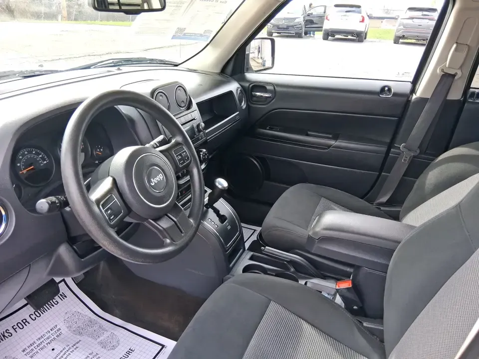 2016 Jeep Patriot Sport (1C4NJRBB2GD) with an 2.4L I-4 DOHC engine, located at 1230 East Main St, Xenia, OH, 45385, (937) 908-9800, 39.688026, -83.910172 - Ready for weekend escapes to John Bryan State Park, a confident commute down US-35, or a practical SUV that can handle Ohio's surprise weather? This 2016 Jeep Patriot Sport in Billet Silver Metallic Clearcoat is built for drivers who want everyday flexibility-room for errands and gear, sure-footed c - Photo#9