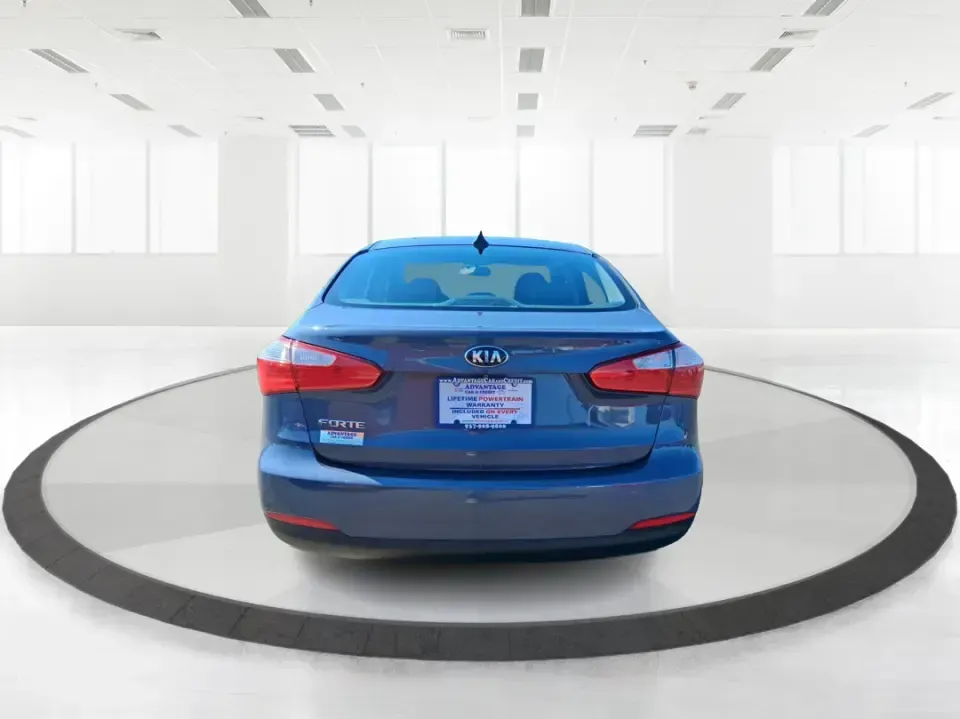 2016 Kia Forte LX (KNAFX4A63G5) with an 1.8L I-4 DOHC engine, 6-Speed Automatic transmission, located at 1951 S Dayton Lakeview Rd., New Carlisle, OH, 45344, (937) 908-9800, 39.890999, -84.050255 - Need a dependable commuter that still feels comfortable for weekend plans around the Miami Valley? This **2016 Kia Forte LX** in **Steel Blue Metallic** is a smart, budget-friendly sedan that fits real life in **Fairborn, Ohio**-whether you're driving to Wright-Patterson AFB, heading to class, or cr - Photo#3