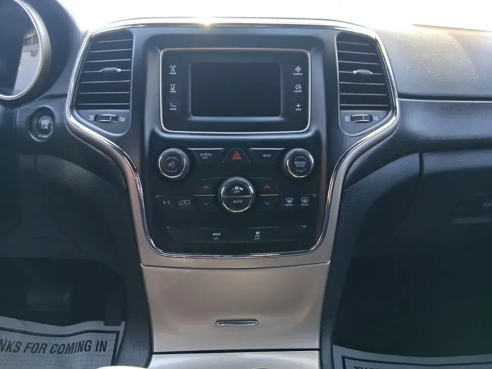 2015 Jeep Grand Cherokee Laredo (1C4RJFAG4FC) with an 3.6L V-6 DOHC engine, 8-Speed Automatic transmission, located at 1230 East Main St, Xenia, OH, 45385, (937) 908-9800, 39.688026, -83.910172 - Weekend getaways to Hocking Hills, confident winter drives to work, and comfortable family errands around town all get easier in a capable SUV like this 2015 Jeep Grand Cherokee Laredo 4WD. Finished in Maximum Steel Metallic Clearcoat, this Grand Cherokee blends rugged Jeep attitude with everyday co - Photo#13