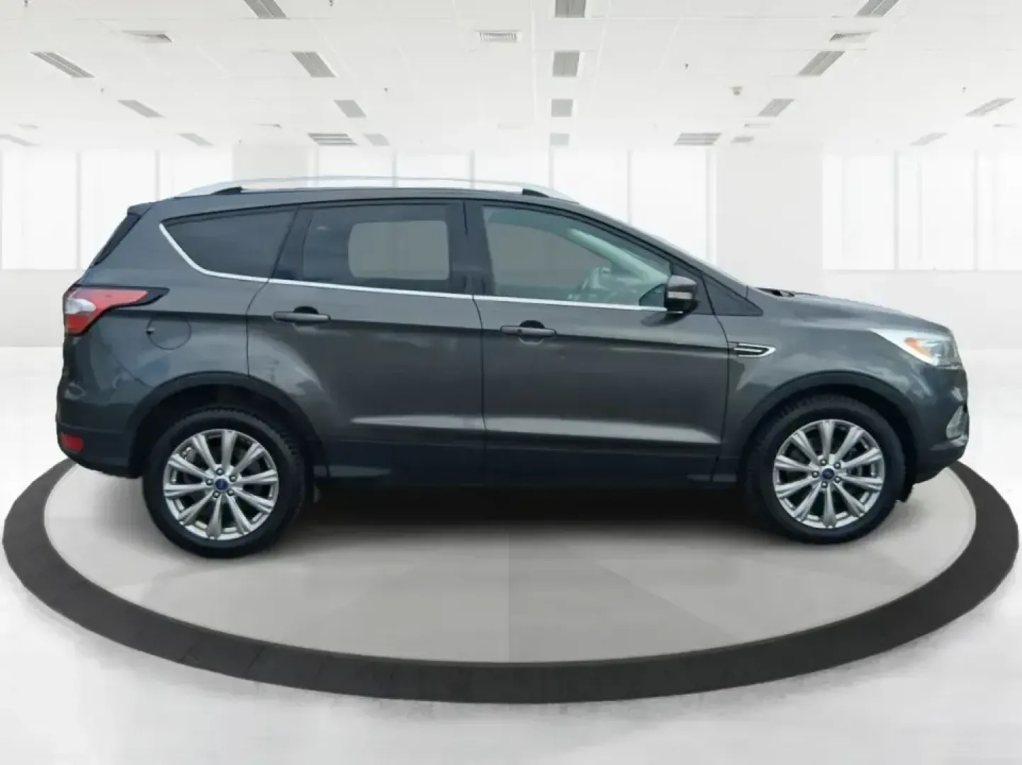 2018 Ford Escape Titanium (1FMCU9J94JU) with an EcoBoost 2L I-4 gasoline direct injection engine, 6A transmission, located at 4508 South Dixie Dr, Moraine, OH, 45439, (937) 908-9800, 39.689976, -84.218452 - Pack up the kids, load the groceries, or point the hood toward a weekend getaway-this 2018 Ford Escape Titanium is the kind of compact SUV that fits real life in Moraine. With confident capability for Ohio weather and a comfortable, tech-forward cabin, it's ideal for long commutes down I-75, quick e - Photo#1