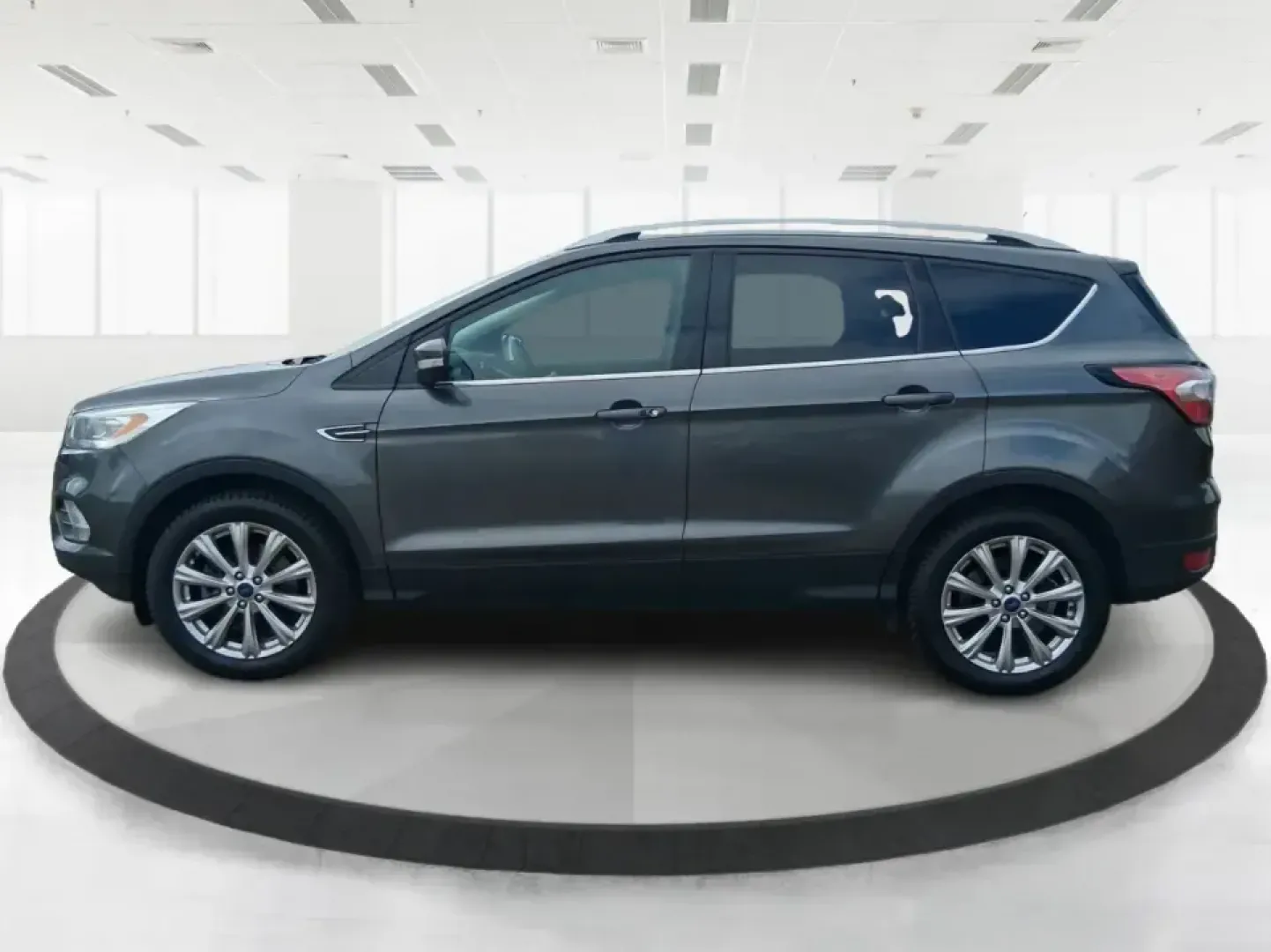 2018 Ford Escape Titanium (1FMCU9J94JU) with an EcoBoost 2L I-4 gasoline direct injection engine, 6A transmission, located at 4508 South Dixie Dr, Moraine, OH, 45439, (937) 908-9800, 39.689976, -84.218452 - Pack up the kids, load the groceries, or point the hood toward a weekend getaway-this 2018 Ford Escape Titanium is the kind of compact SUV that fits real life in Moraine. With confident capability for Ohio weather and a comfortable, tech-forward cabin, it's ideal for long commutes down I-75, quick e - Photo#5