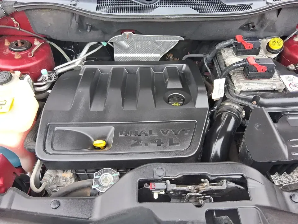 2014 Jeep Patriot Latitude 2WD (1C4NJPFB3ED) with an 2.4L L4 DOHC 16V engine, located at 8750 N County Rd 25A, Piqua, OH, 45356, (937) 908-9800, 40.164391, -84.232513 - Picture a weekday commute down I70 followed by a Saturday escape to parks and backroads around Clark County-this 2014 Jeep Patriot Latitude is the kind of compact SUV that fits both routines without feeling oversized. Finished in Deep Cherry Red Crystal Pearlcoat and showing 90,565 miles, it's a pra - Photo#11
