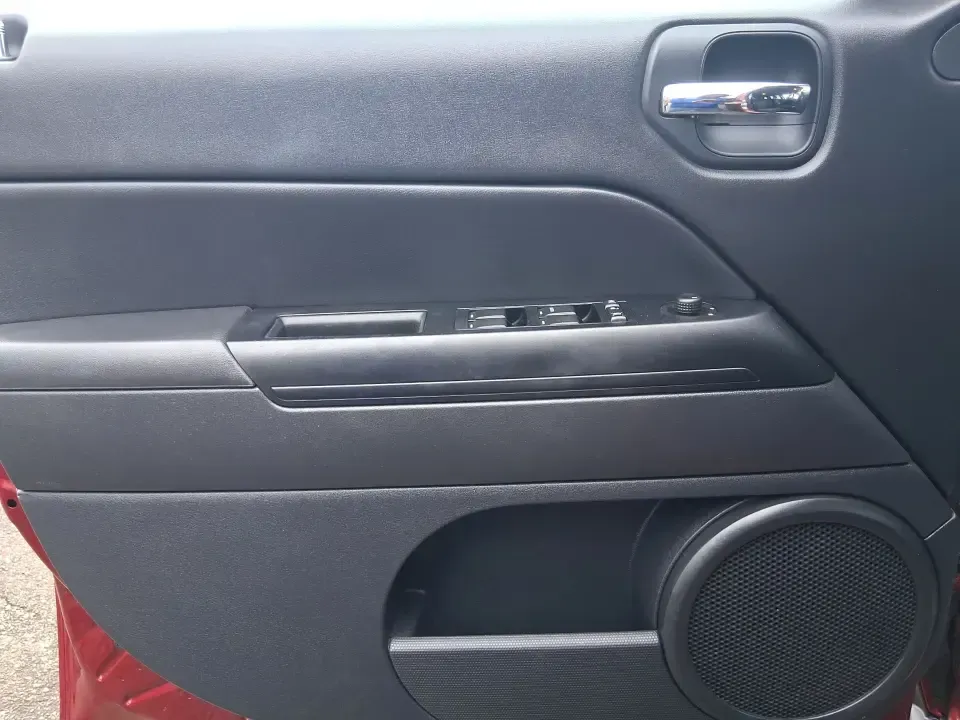 2014 Jeep Patriot Latitude 2WD (1C4NJPFB3ED) with an 2.4L L4 DOHC 16V engine, located at 8750 N County Rd 25A, Piqua, OH, 45356, (937) 908-9800, 40.164391, -84.232513 - Picture a weekday commute down I70 followed by a Saturday escape to parks and backroads around Clark County-this 2014 Jeep Patriot Latitude is the kind of compact SUV that fits both routines without feeling oversized. Finished in Deep Cherry Red Crystal Pearlcoat and showing 90,565 miles, it's a pra - Photo#17