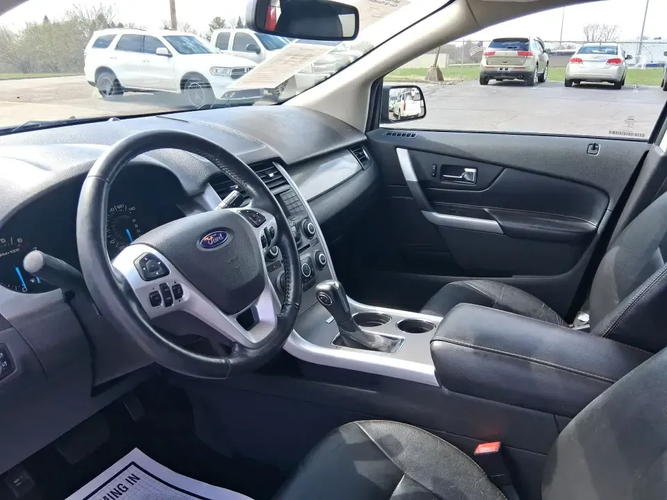 2013 Ford Edge SEL (2FMDK4JC3DB) with an 3.5L V-6 DOHC engine, 6-Speed Automatic transmission, located at 1230 East Main St, Xenia, OH, 45385, (937) 908-9800, 39.688026, -83.910172 - Pack up the kids, cue up your favorite playlist, and point the nose toward a weekend getaway-this 2013 Ford Edge SEL is the kind of comfortable, confident SUV that fits real life in Troy, Ohio. Whether you're commuting up SR-25A, running after-school errands near downtown Troy, or loading up for a r - Photo#9