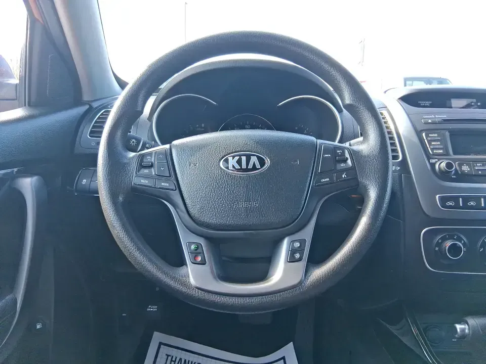 2014 Kia Sorento LX AWD (5XYKTCA65EG) with an 2.4L L4 DOHC 16V engine, 6-Speed Automatic transmission, located at 8750 N County Rd 25A, Piqua, OH, 45356, (937) 908-9800, 40.164391, -84.232513 - Need an SUV that can handle Ohio's changing seasons, school drop-offs, and weekend getaways without feeling like a chore? This **2014 Kia Sorento LX AWD** is built for real-life driving in and around **Piqua, OH**-from rainy commutes on **US-36** to snowy mornings near **I-75**, and family trips out- Photo#16