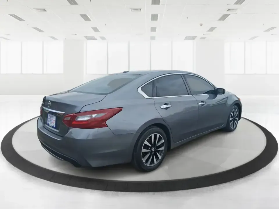 2018 Nissan Altima 2.5 SV (1N4AL3AP0JC) with an 2.5L I-4 DOHC engine, CVT transmission, located at 4508 South Dixie Dr, Moraine, OH, 45439, (937) 908-9800, 39.689976, -84.218452 - Make every mile easier-whether you're tackling a long commute down I75, running kids to practice after school, or planning a weekend day trip to the Miami County Fairgrounds. This 2018 Nissan Altima 2.5 SV in Gun Metallic is the kind of comfortable, efficient sedan that fits real-life schedules in P - Photo#2