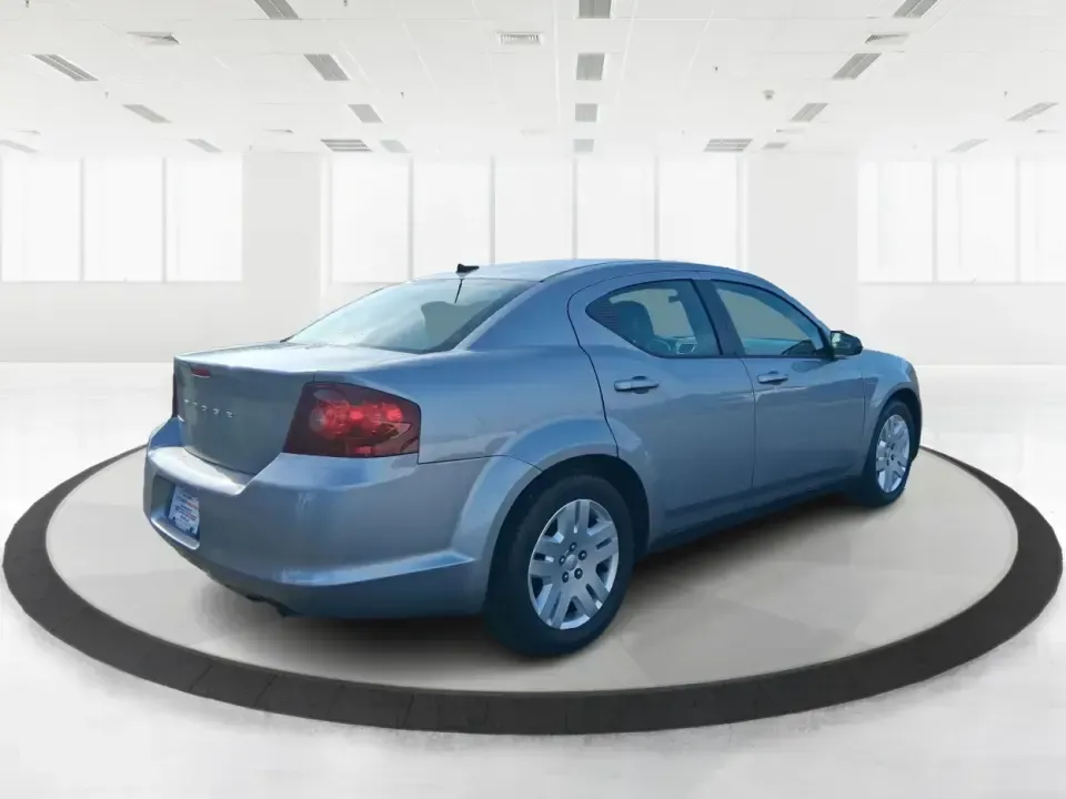 2014 Dodge Avenger SE (1C3CDZAB8EN) with an 2.4L L4 DOHC 16V engine, 4-Speed Automatic transmission, located at 1099 N County Rd 25A, Troy, OH, 45373, (937) 908-9800, 40.057079, -84.212883 - Need a dependable sedan for the daily drive from Troy to Dayton, quick school drop-offs, or comfortable weekend runs up I75? This 2014 Dodge Avenger SE is built for real-life Ohio schedules-easy to park downtown, roomy enough for five, and efficient for commuting along N County Rd 25A, Main Street,- Photo#2