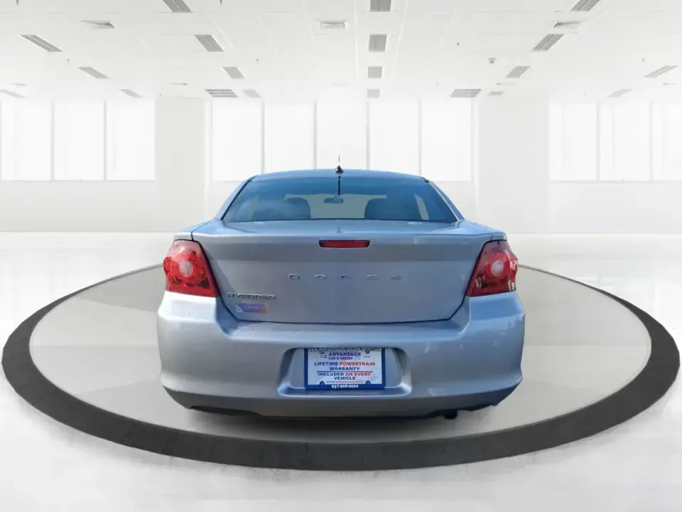 2014 Dodge Avenger SE (1C3CDZAB8EN) with an 2.4L L4 DOHC 16V engine, 4-Speed Automatic transmission, located at 1099 N County Rd 25A, Troy, OH, 45373, (937) 908-9800, 40.057079, -84.212883 - Need a dependable sedan for the daily drive from Troy to Dayton, quick school drop-offs, or comfortable weekend runs up I75? This 2014 Dodge Avenger SE is built for real-life Ohio schedules-easy to park downtown, roomy enough for five, and efficient for commuting along N County Rd 25A, Main Street,- Photo#3