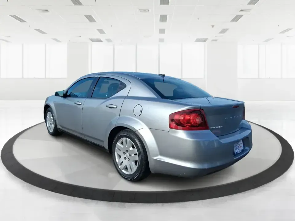 2014 Dodge Avenger SE (1C3CDZAB8EN) with an 2.4L L4 DOHC 16V engine, 4-Speed Automatic transmission, located at 1099 N County Rd 25A, Troy, OH, 45373, (937) 908-9800, 40.057079, -84.212883 - Need a dependable sedan for the daily drive from Troy to Dayton, quick school drop-offs, or comfortable weekend runs up I75? This 2014 Dodge Avenger SE is built for real-life Ohio schedules-easy to park downtown, roomy enough for five, and efficient for commuting along N County Rd 25A, Main Street,- Photo#4
