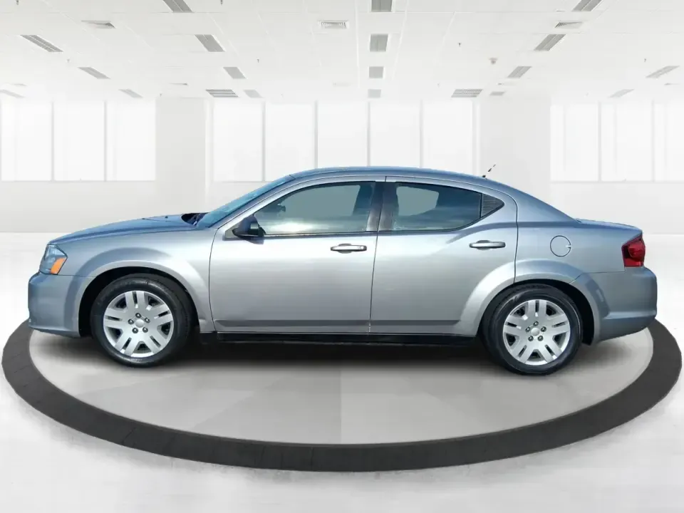 2014 Dodge Avenger SE (1C3CDZAB8EN) with an 2.4L L4 DOHC 16V engine, 4-Speed Automatic transmission, located at 1099 N County Rd 25A, Troy, OH, 45373, (937) 908-9800, 40.057079, -84.212883 - Need a dependable sedan for the daily drive from Troy to Dayton, quick school drop-offs, or comfortable weekend runs up I75? This 2014 Dodge Avenger SE is built for real-life Ohio schedules-easy to park downtown, roomy enough for five, and efficient for commuting along N County Rd 25A, Main Street,- Photo#5