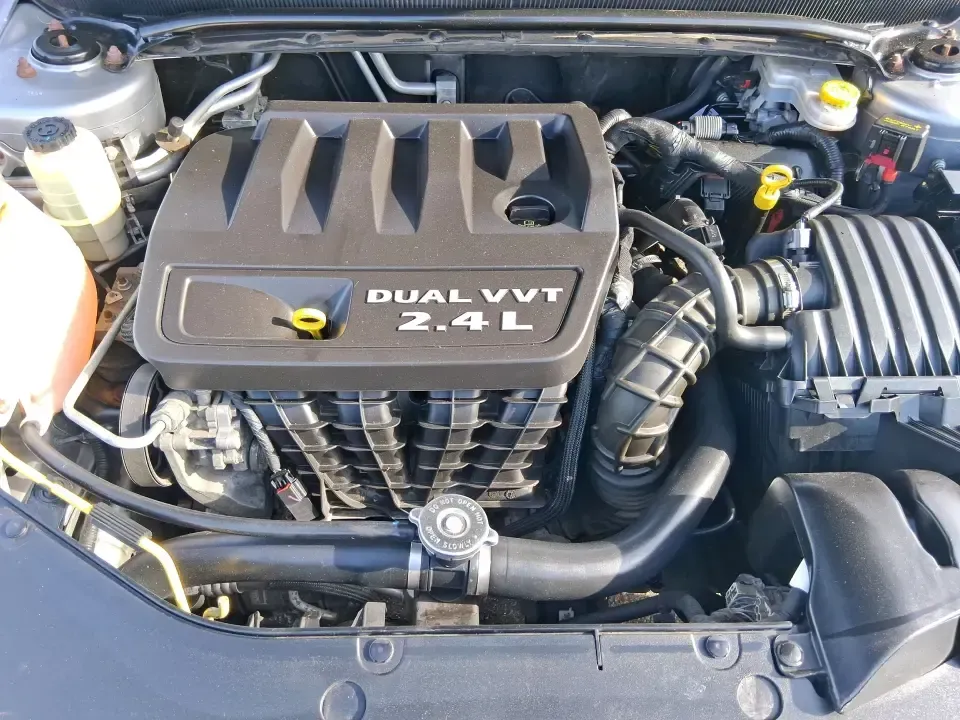 2014 Dodge Avenger SE (1C3CDZAB8EN) with an 2.4L L4 DOHC 16V engine, 4-Speed Automatic transmission, located at 1099 N County Rd 25A, Troy, OH, 45373, (937) 908-9800, 40.057079, -84.212883 - Need a dependable sedan for the daily drive from Troy to Dayton, quick school drop-offs, or comfortable weekend runs up I75? This 2014 Dodge Avenger SE is built for real-life Ohio schedules-easy to park downtown, roomy enough for five, and efficient for commuting along N County Rd 25A, Main Street,- Photo#11
