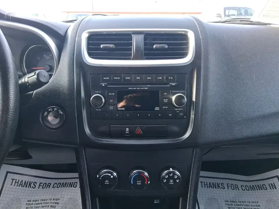 2014 Dodge Avenger SE (1C3CDZAB8EN) with an 2.4L L4 DOHC 16V engine, 4-Speed Automatic transmission, located at 1099 N County Rd 25A, Troy, OH, 45373, (937) 908-9800, 40.057079, -84.212883 - Need a dependable sedan for the daily drive from Troy to Dayton, quick school drop-offs, or comfortable weekend runs up I75? This 2014 Dodge Avenger SE is built for real-life Ohio schedules-easy to park downtown, roomy enough for five, and efficient for commuting along N County Rd 25A, Main Street,- Photo#13