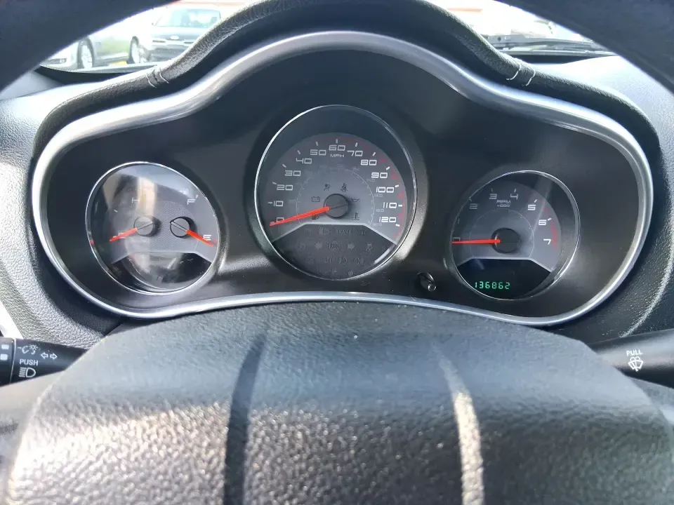 2014 Dodge Avenger SE (1C3CDZAB8EN) with an 2.4L L4 DOHC 16V engine, 4-Speed Automatic transmission, located at 1099 N County Rd 25A, Troy, OH, 45373, (937) 908-9800, 40.057079, -84.212883 - Need a dependable sedan for the daily drive from Troy to Dayton, quick school drop-offs, or comfortable weekend runs up I75? This 2014 Dodge Avenger SE is built for real-life Ohio schedules-easy to park downtown, roomy enough for five, and efficient for commuting along N County Rd 25A, Main Street,- Photo#15