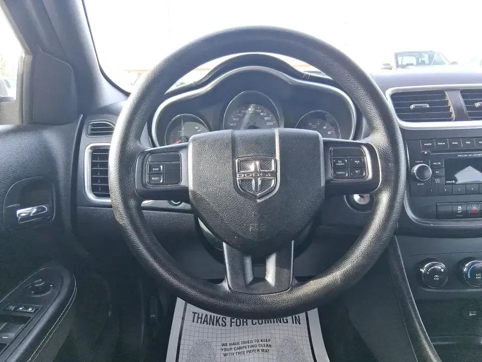 2014 Dodge Avenger SE (1C3CDZAB8EN) with an 2.4L L4 DOHC 16V engine, 4-Speed Automatic transmission, located at 1099 N County Rd 25A, Troy, OH, 45373, (937) 908-9800, 40.057079, -84.212883 - Need a dependable sedan for the daily drive from Troy to Dayton, quick school drop-offs, or comfortable weekend runs up I75? This 2014 Dodge Avenger SE is built for real-life Ohio schedules-easy to park downtown, roomy enough for five, and efficient for commuting along N County Rd 25A, Main Street,- Photo#16