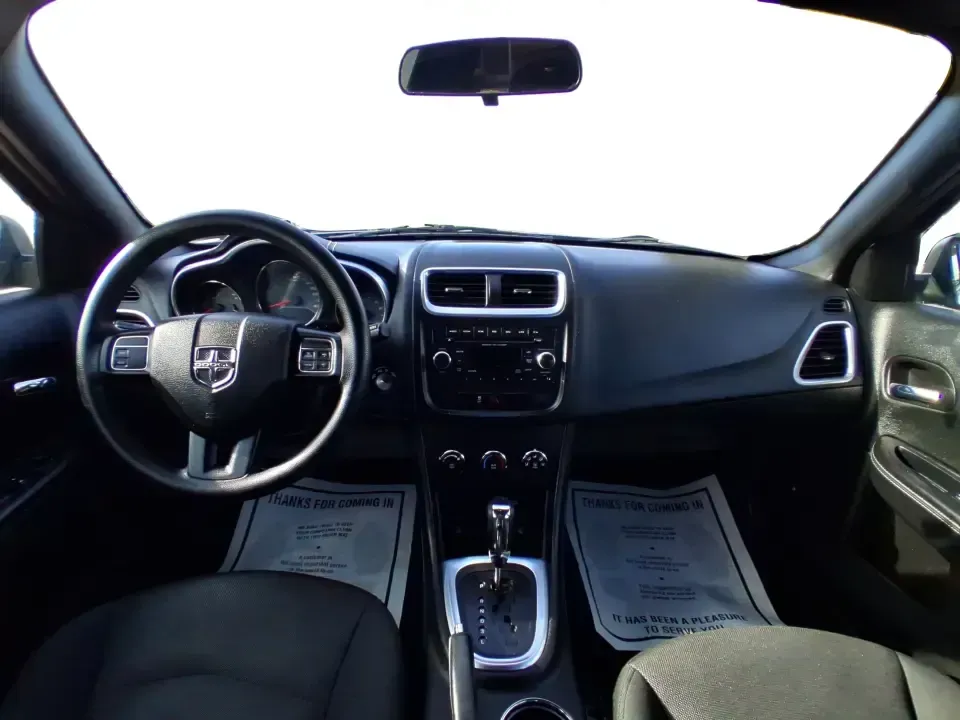 2014 Dodge Avenger SE (1C3CDZAB8EN) with an 2.4L L4 DOHC 16V engine, 4-Speed Automatic transmission, located at 1184 Kauffman Ave, Fairborn, OH, 45324, (937) 908-9800, 39.807072, -84.030914 - Picture an easy, stress-free daily commute from Moraine to downtown Dayton, with enough comfort for the school run, errands along South Dixie Drive, and the occasional weekend escape to Carillon Historical Park or a movie night near the Dayton Mall. If you want a practical sedan that fits real life- - Photo#19