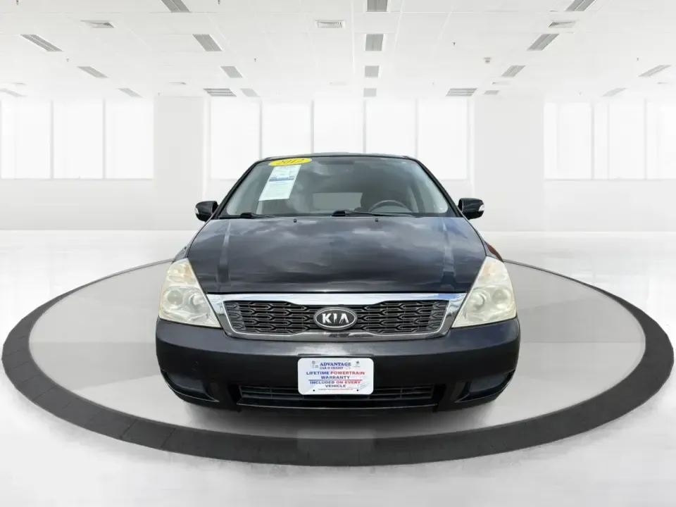 2012 Kia Sedona LX (KNDMG4C78C6) with an 3.5L V-6 DOHC engine, 5-Speed Automatic transmission, located at 401 Woodman Dr, Riverside, OH, 45431, (937) 908-9800, 39.760899, -84.123421 - Picture the next family road trip, soccer Saturday, or airport pickup where everyone actually fits comfortably-plus there's room left for groceries, strollers, and weekend gear. This 2012 Kia Sedona LX in Aurora Black is built for real life: school drop-offs, long commutes across the Miami Valley, a - Photo#7