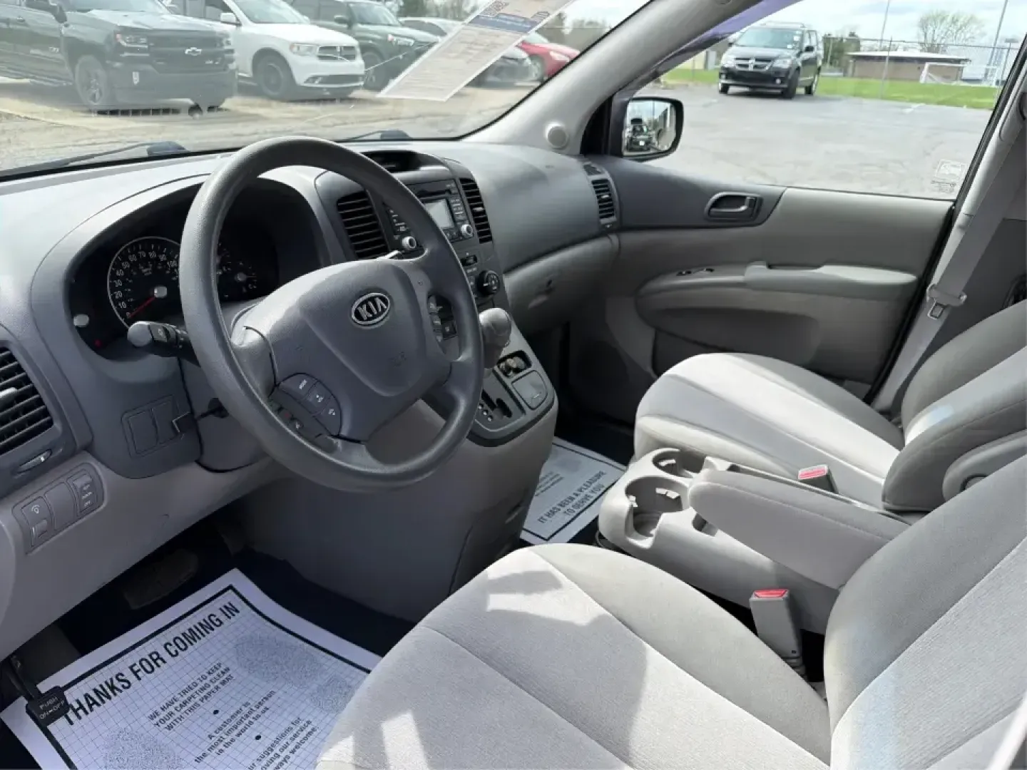 2012 Kia Sedona LX (KNDMG4C78C6) with an 3.5L V-6 DOHC engine, 5-Speed Automatic transmission, located at 1184 Kauffman Ave, Fairborn, OH, 45324, (937) 908-9800, 39.807072, -84.030914 - Picture the next family road trip, soccer Saturday, or airport pickup where everyone actually fits comfortably-plus there's room left for groceries, strollers, and weekend gear. This 2012 Kia Sedona LX in Aurora Black is built for real life: school drop-offs, long commutes across the Miami Valley, a - Photo#9