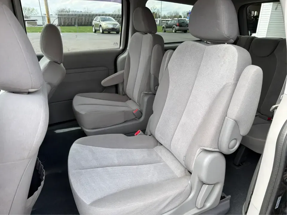 2012 Kia Sedona LX (KNDMG4C78C6) with an 3.5L V-6 DOHC engine, 5-Speed Automatic transmission, located at 401 Woodman Dr, Riverside, OH, 45431, (937) 908-9800, 39.760899, -84.123421 - Picture the next family road trip, soccer Saturday, or airport pickup where everyone actually fits comfortably-plus there's room left for groceries, strollers, and weekend gear. This 2012 Kia Sedona LX in Aurora Black is built for real life: school drop-offs, long commutes across the Miami Valley, a - Photo#10