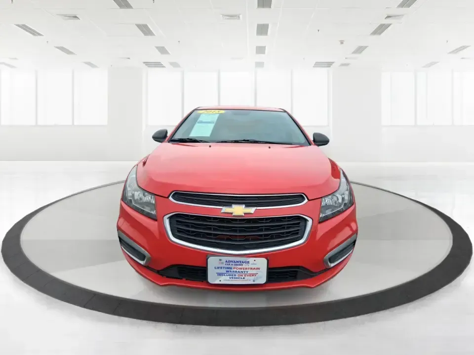 2015 Chevrolet Cruze LS Auto (1G1PA5SG9F7) with an ECOTEC 1.8L I-4 DOHC engine, 6-Speed Automatic transmission, located at 8750 N County Rd 25A, Piqua, OH, 45356, (937) 908-9800, 40.164391, -84.232513 - Picture an easy, affordable daily commute that still feels comfortable on I75, quick trips to downtown Piqua for dinner, and weekend errands that don't drain your budget at the pump. This 2015 Chevrolet Cruze LS Auto in eye-catching Red Hot is a smart, practical sedan for commuters, first-time buyer - Photo#7