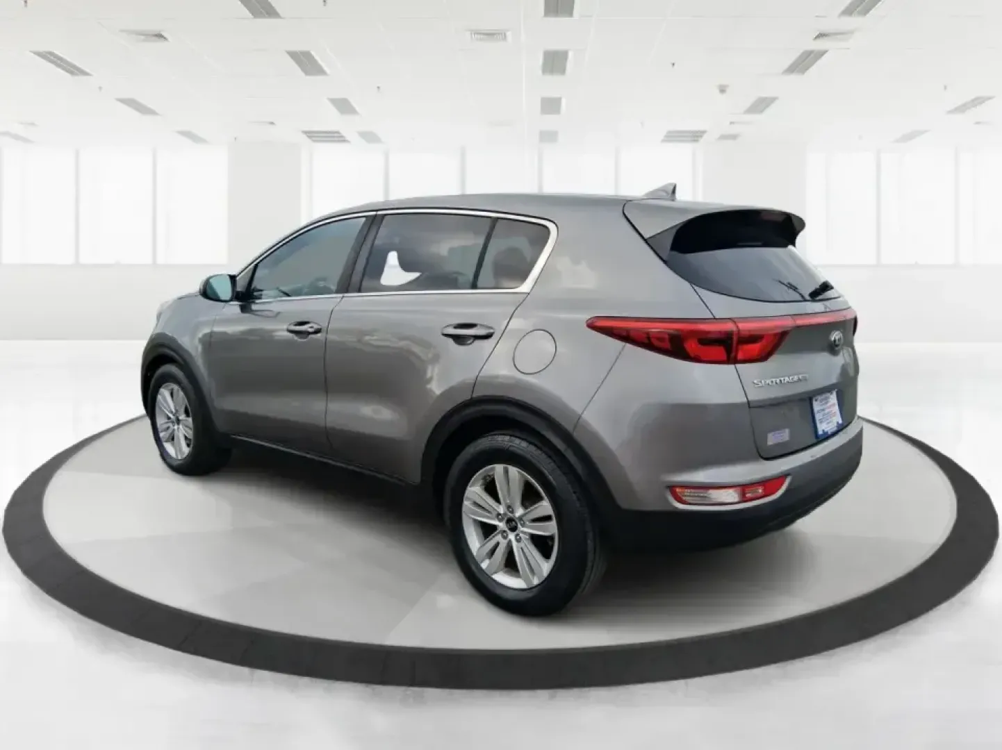 2018 Kia Sportage LX (KNDPM3AC0J7) with an Theta II 2.4L I-4 gasoline direct injection engine, 6A transmission, located at 1099 N County Rd 25A, Troy, OH, 45373, (937) 908-9800, 40.057079, -84.212883 - Weekend road trips to the Miami County Fair, daily commutes down I75, or quick errands between Downtown Troy and the shops near West Main Street-this 2018 Kia Sportage LX is the kind of compact SUV that fits real life. With its versatile crossover layout, confident road manners, and smart cargo spac - Photo#4