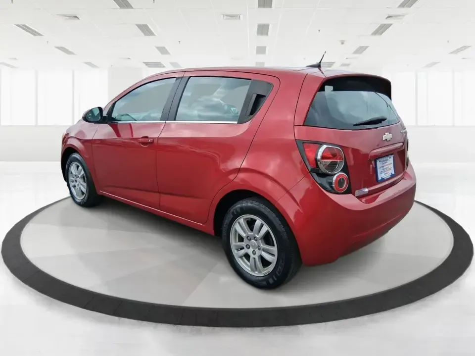 2014 Chevrolet Sonic LT Auto (1G1JC6SH7E4) with an 1.8L L4 DOHC 24V engine, 6-Speed Automatic transmission, located at 1230 East Main St, Xenia, OH, 45385, (937) 908-9800, 39.688026, -83.910172 - Need a smart, easy-to-park commuter that still has room for grocery runs, school backpacks, and weekend getaways to Dayton or the Miami Valley? This 2014 Chevrolet Sonic LT Auto Hatchback delivers the kind of real-world versatility that fits everyday life in Troy-zippy around town, efficient for lon - Photo#4