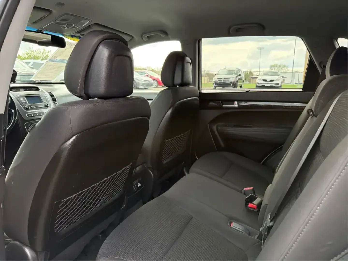 2014 Kia Sorento LX V6 (5XYKTDA74EG) with an Lambda II 3.3L V-6 gasoline direct injection engine, 6-Speed Automatic transmission, located at 8750 N County Rd 25A, Piqua, OH, 45356, (937) 908-9800, 40.164391, -84.232513 - Picture your next Ohio weekend: the kids loaded up for a day at Johnston Farm and Indian Agency, groceries stowed for the week, and enough power on tap to handle I75 merges without breaking a sweat. This 2014 Kia Sorento LX V6 in Bright Silver is the kind of do-it-all SUV that fits real life in Pi - Photo#10
