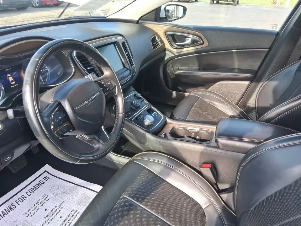 2015 Chrysler 200 C (1C3CCCCG6FN) with an 3.6L V6 DOHC 24V FFV engine, 9-Speed Automatic transmission, located at 4508 South Dixie Dr, Moraine, OH, 45439, (937) 908-9800, 39.689976, -84.218452 - Need a dependable sedan for the daily commute up I75, quick school drop-offs, or a comfortable weekend drive to downtown Piqua and the Great Miami River Trail? This 2015 Chrysler 200 C is the kind of practical-yet-upgraded ride that fits real life-quiet on longer trips, easy to park around local sho - Photo#9