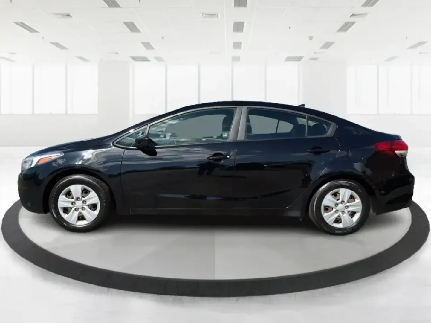 2018 Kia Forte LX (3KPFK4A79JE) with an 2L I-4 DOHC engine, 6M transmission, located at 401 Woodman Dr, Riverside, OH, 45431, (937) 908-9800, 39.760899, -84.123421 - Need a dependable commuter that's easy to park downtown, comfortable for I-75 and SR-725 traffic, and still stylish enough for dinner in the Dayton area? This 2018 Kia Forte LX in Aurora Black is a smart, budget-friendly sedan that fits real life in Moraine, OH-whether you're stacking miles for work - Photo#5